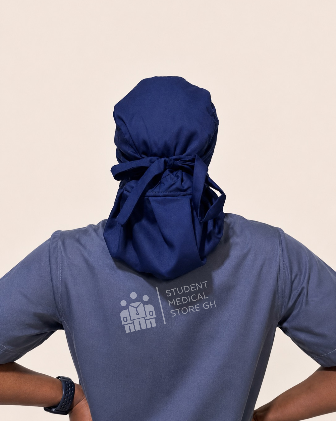 Back view of SMSG navy scrub cap showing ponytail pouch and ties